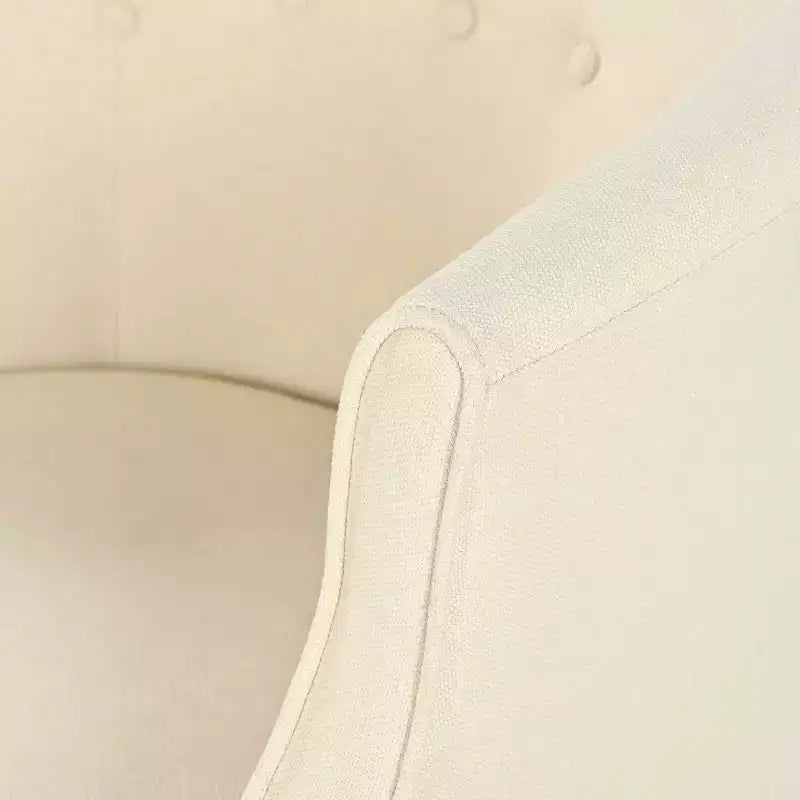 Poltrona Club moderna capitonné con gambe in legno di betulla